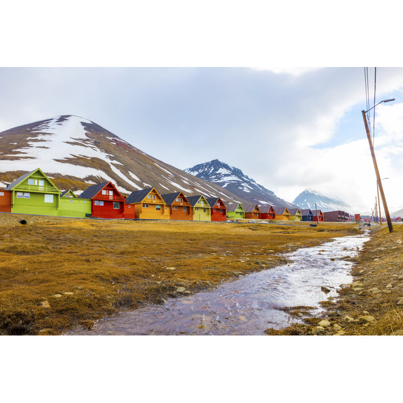 Row Of Colorful Wooden Houses At Longyearbyen In Svalbard by Kjekol - Wrapped Canvas Print, 12"H x 18"W