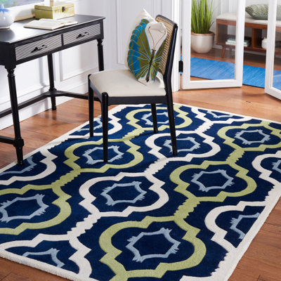 Tapis vert / bleu / beige en laine touffeté à motif géométrique Carolene