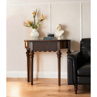 Elegant Dark Wood Console Table with Scalloped Apron