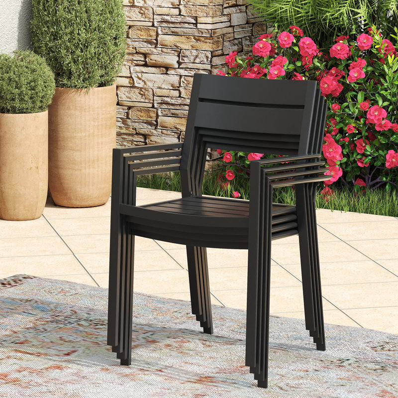 4-Person Round Patio Dining Set with Metal Dining Table and 4 Stackable Metal Armrest Chairs, Black/Black