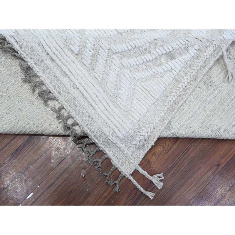 Tapis oriental ivoire en laine noué à la main 9 pi 11 po x 14 pi 2 po