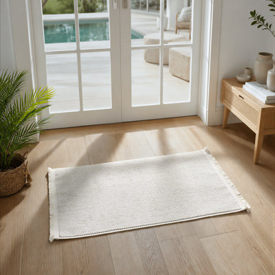 Tapis texturé à franges