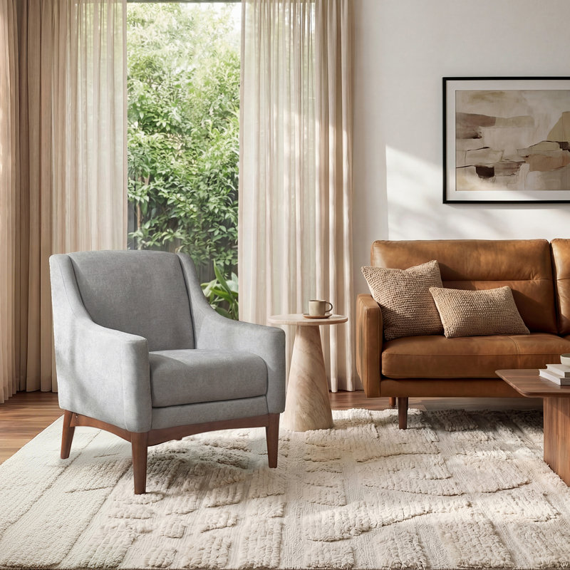 Fauteuil Arshanti avec pieds en bois massif, Gris
