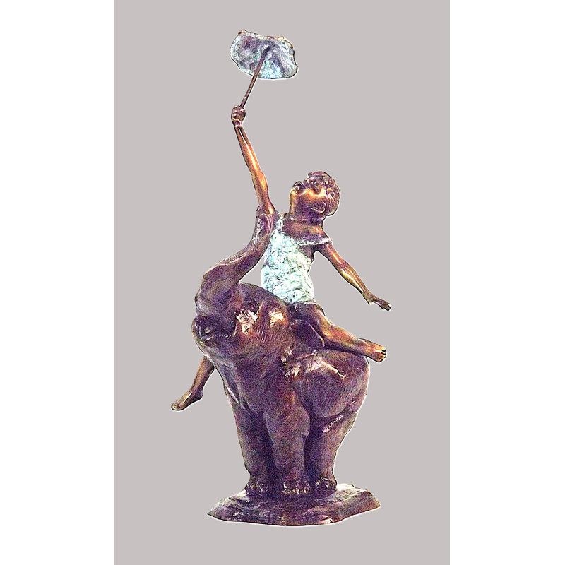 Girl on elephant