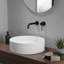 Robinet de lavabo mural avec poignée simple et bonde escamotable