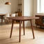Table de salle à manger carrée de style moderne du milieu du siècle avec bord arrondi, table de cuisine en bois brun noyer avec pieds fuselés et évasés pour 2 à 4 personnes