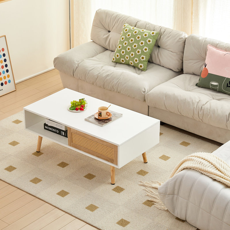 Table basse en rotin de 41,34 pouces avec porte coulissante, pieds en bois massif et design moderne pour le salon