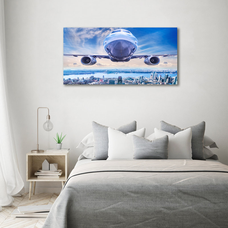 Plane Over The City - Wrapped Canvas Print