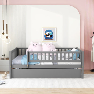 Full Size Wood Daybed With Trundle And Fence Guardrails For Extra Sleeping Space And Security