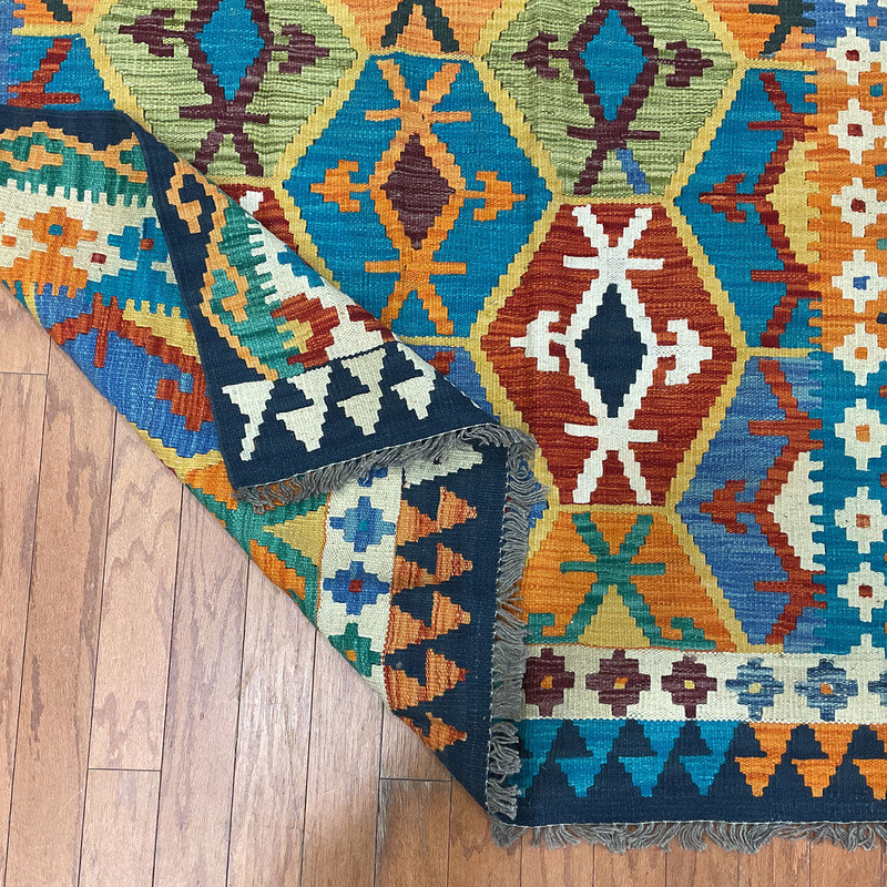 Tapis unique bleu, brun et jaune de 4 pi 5 po x 6 pi 7 po