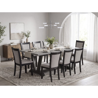 L'ensemble de table de cuisine 9 pièces contient une table en bois de ciment et 8 chaises rembourrées en tissu de lin Shitake avec dossier haut - finition noire brossée