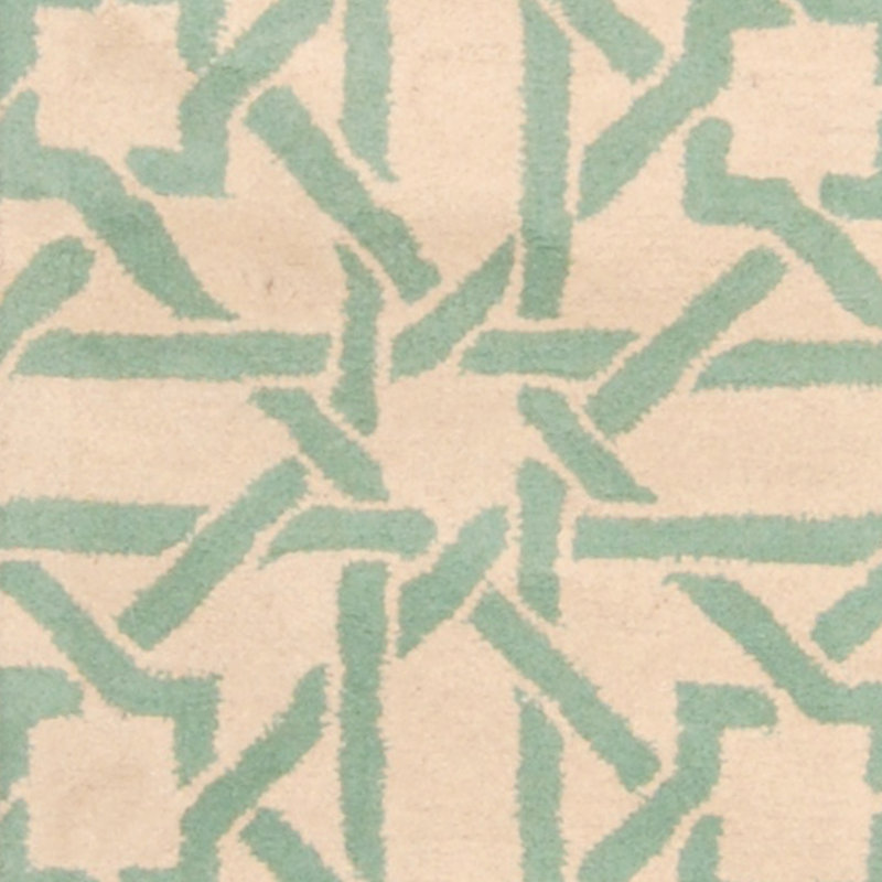 Tapis ivoire / bleu sarcelle touffeté à la main