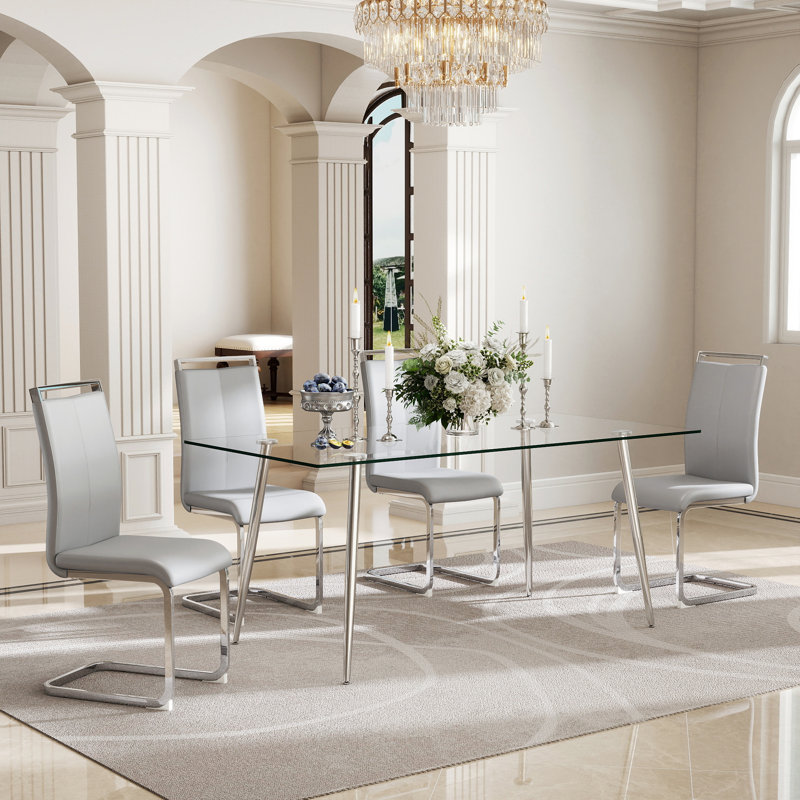 Ensemble de table de salle à manger rectangulaire moderne en verre avec chaises rembourrées en polyuréthane 4/6, pieds chromés argent / noir / or pour la salle à manger et la cuisine