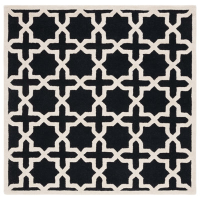 Igna Geometric Handmade Tufted Wool Black/Ivory Area Rug