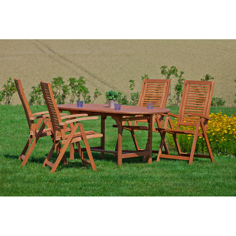 Adalmiina 4 - Person Wood Patio Dining Set with Extendable Oval Table