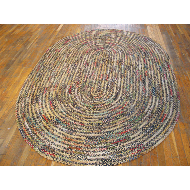 Tapis ovale tressé antique clair et coloré
