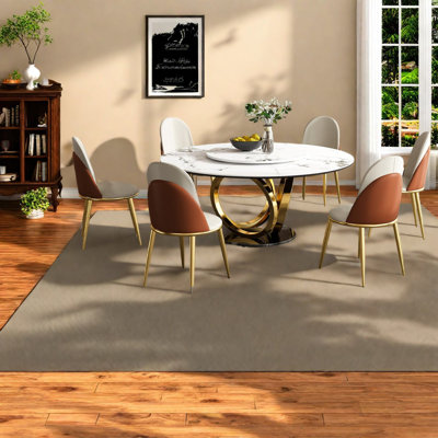 Ensemble de table de salle à manger ronde de pouce (doit inclure la table et la chaise) avec 4 chaises, plateau en pierre frittée, acier doré moderne pour la cuisine