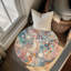 Tapis tressé en marbre chromatique-546308743