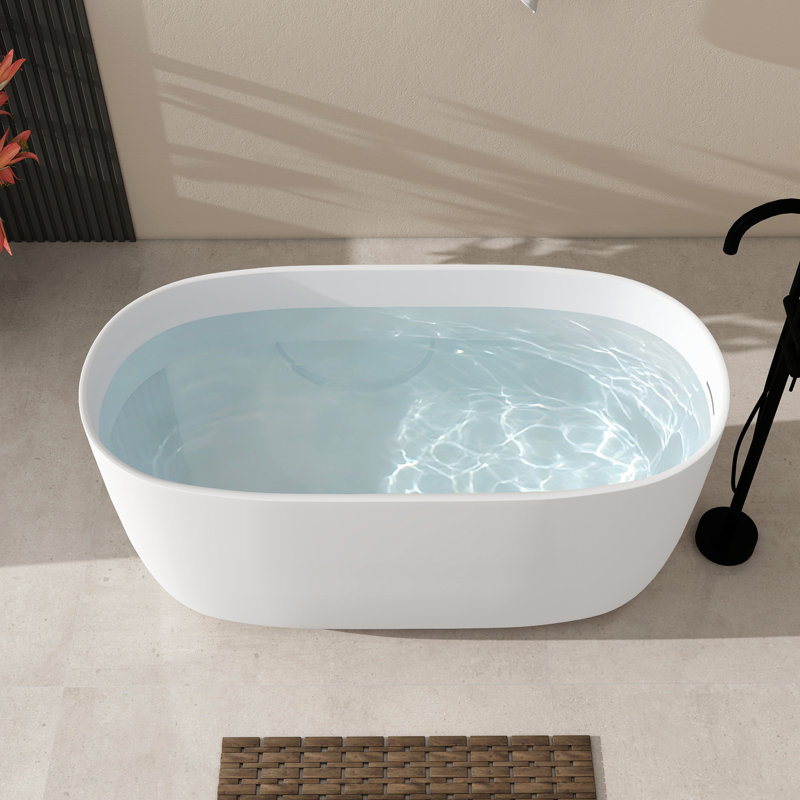 Baignoire de trempage en résine à surface solide de 47 po avec trop-plein et drain escamotable