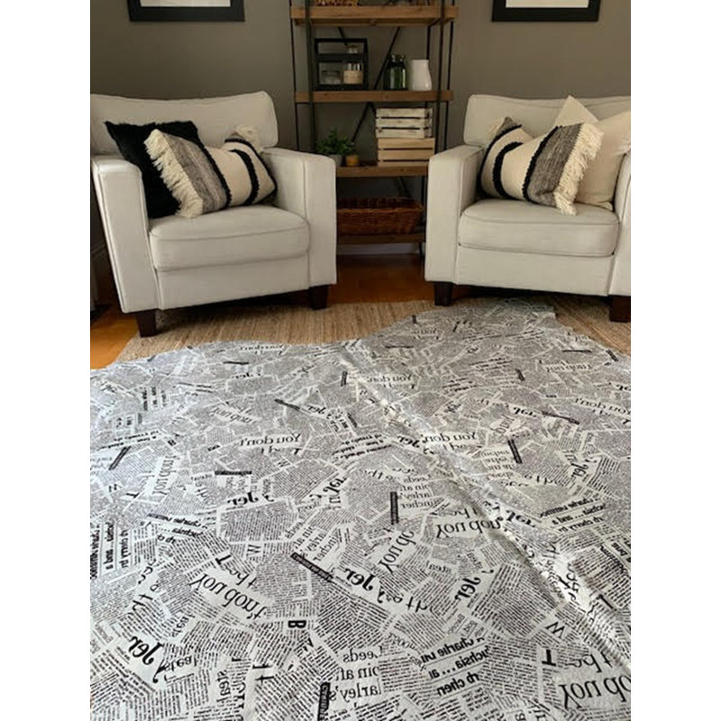 Newspaper Print Cowhide Rug