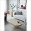Table basse ovale crème moderne pour le salon, surface décorative polyvalente, surface spacieuse