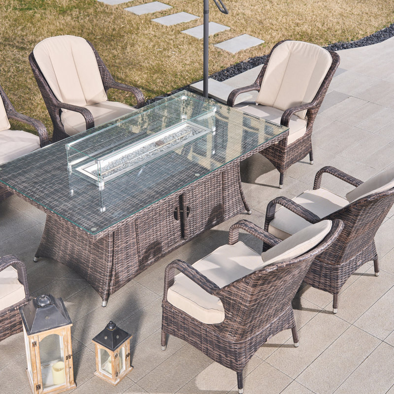 Colville 6 - Person Wicker Patio Dining Set with Rectangular Table , Cushions Included