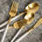 Mazzy Gold with White-Handle 20-Piece Flatware Set