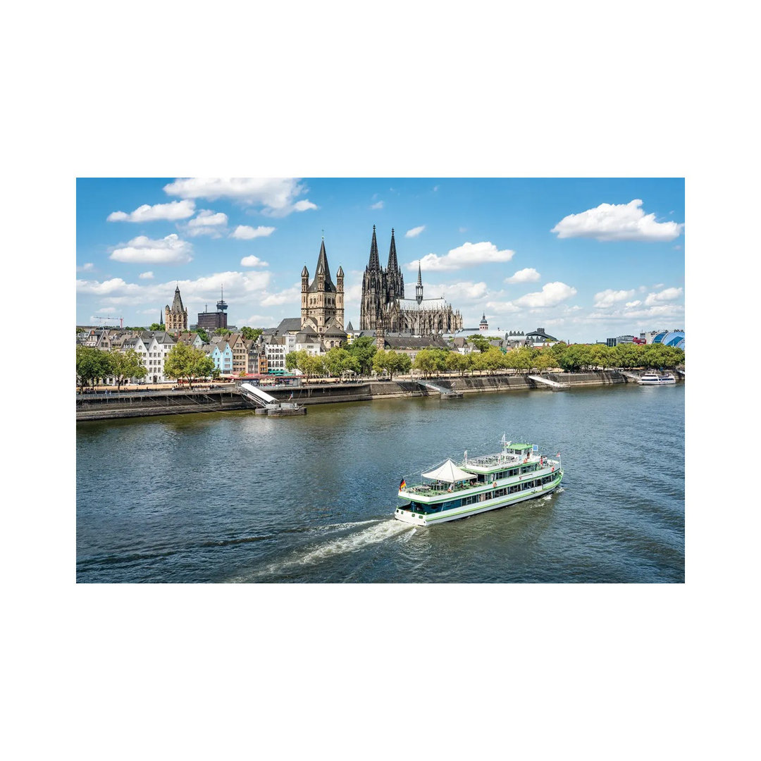 City Of Cologne Along The Rhine River With Cologne Cathedral And Great St. Martin Church by Jan Becke - Wrapped Canvas Print