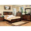 Grand lit en bois massif de style transitionnel avec finition noyer et tête de lit à motif de parquet