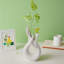 Vase blanc à fleurs pour décoration de fête de mariage