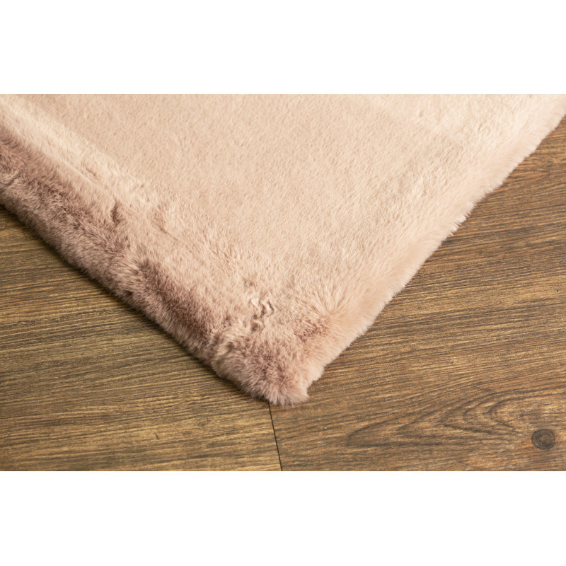 Tapis rose fait à la main