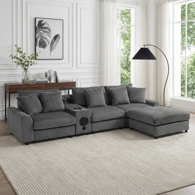 Canapé modulaire en L 114 po en forme de L avec repose-pieds mobile, console avec haut-parleur Bluetooth, chargement USB et sans fil, porte-gobelets et rangement, gris