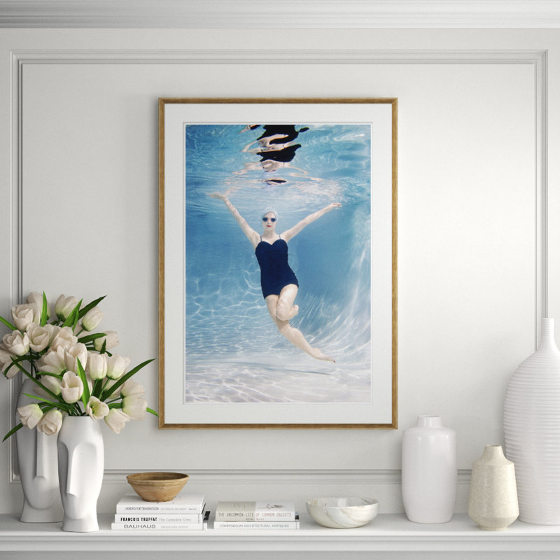 Caucasian Woman Swimming Underwater Framed