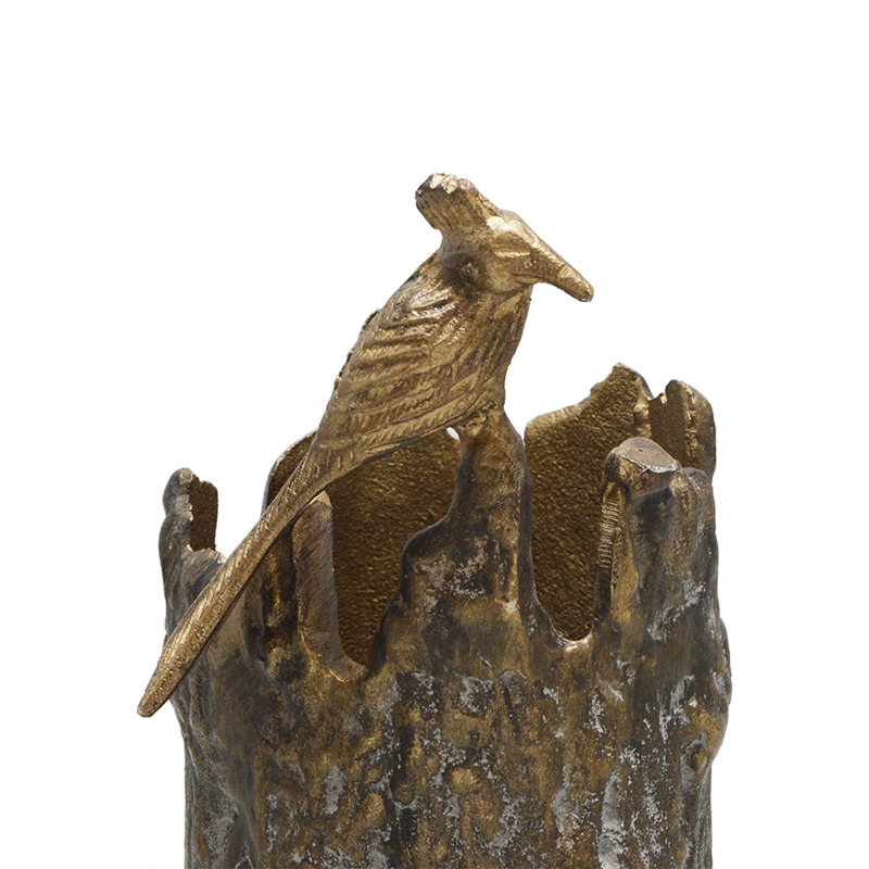 Vase oiseau et tronc d'arbre