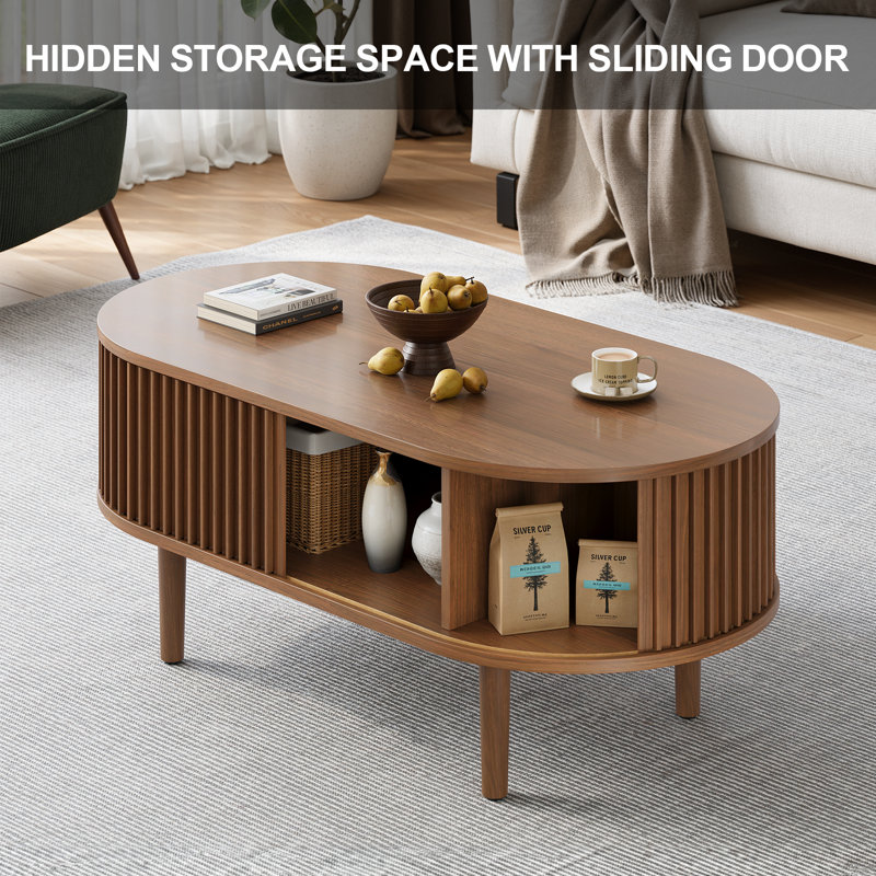 Table basse ovale de 43,4 po avec rangement dissimulé, table d'appoint cannelée avec portes coulissantes en tambour, Noyer
