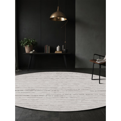 Tapis gris soyeux et moelleux