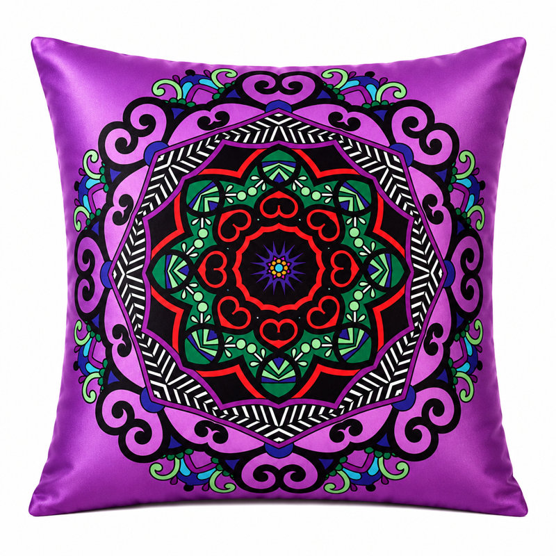 Imprimé kaléidoscope sur coussin mauve