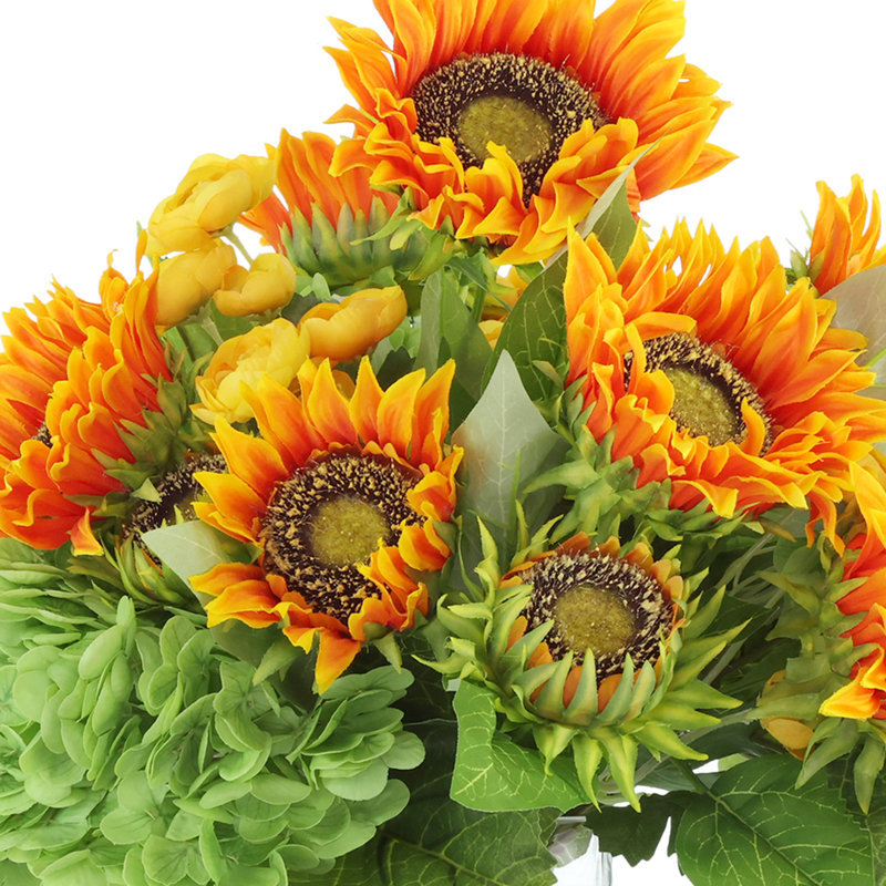 Arrangement d'automne tournesol dans un vase ondulé en verre