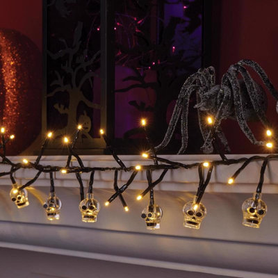  Halloween Warm White 120 ct 9 ft. LED Prelit Skull Lights