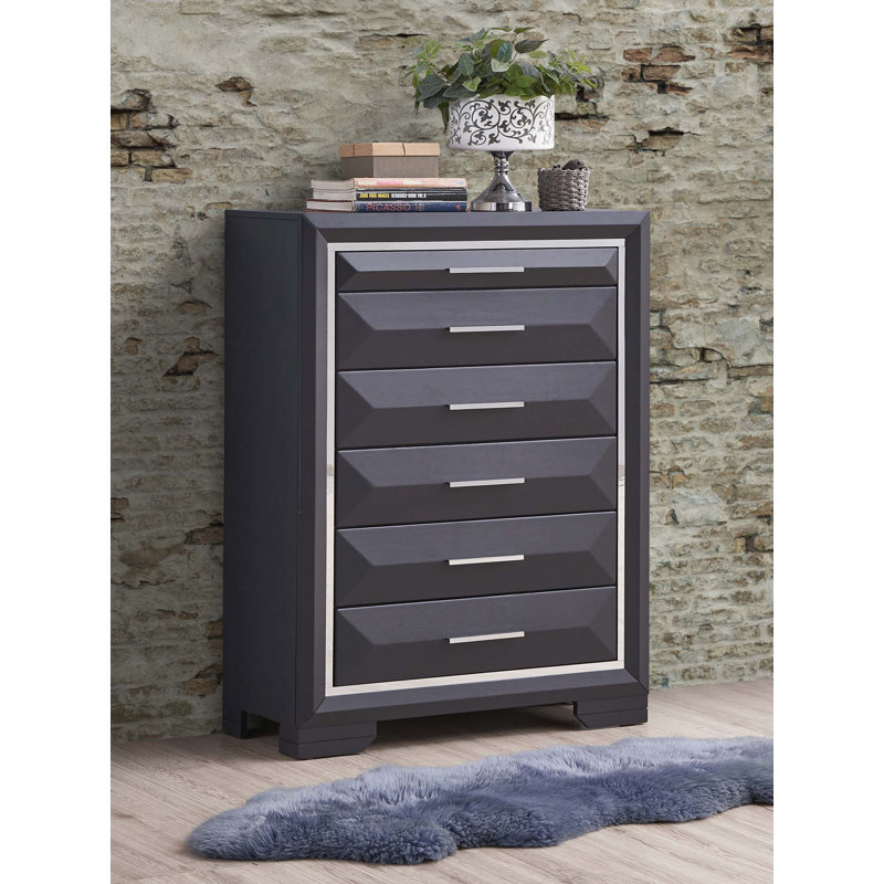 Stylish and Durable Black Chest with Multiple Drawers, Perfect for Organizing and Storing Essentials in Any Room.