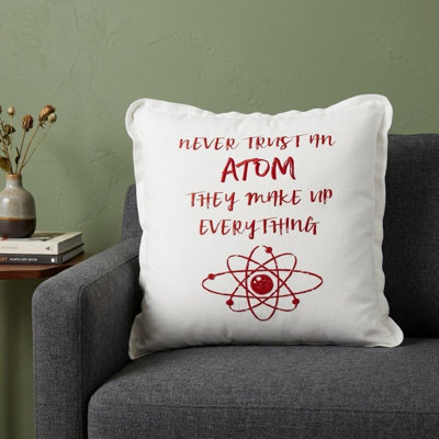 Coussin rouge et blanc Never Trust An Atom