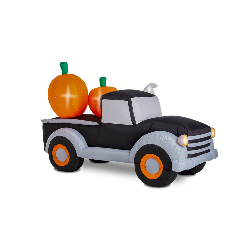 The Holiday Aisle® Truck with Jack-O-Lantern Pumpkins Lighted