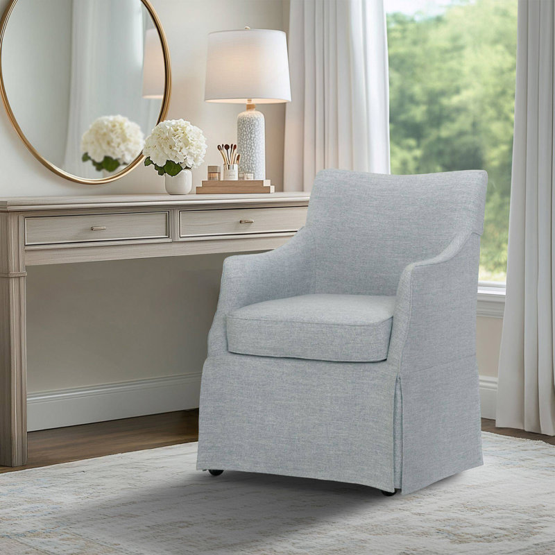 Chaise rembourrée avec accoudoirs et roulettes cachées, Bleu clair