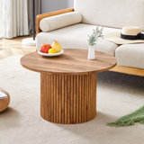 Une table basse circulaire moderne d'un diamètre de 27,5 pouces interprète l'esthétique et la fonctionnalité de la maison. Matériau en panneau de fibres à densité moyenne, conception de pied de table cylindrique. Devenant le point focal visuel de l