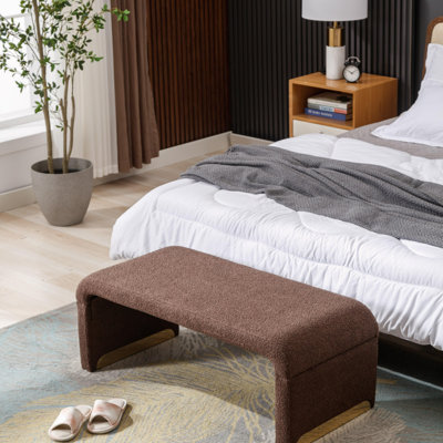Repose-pieds rembourré en tissu Dant Boucle