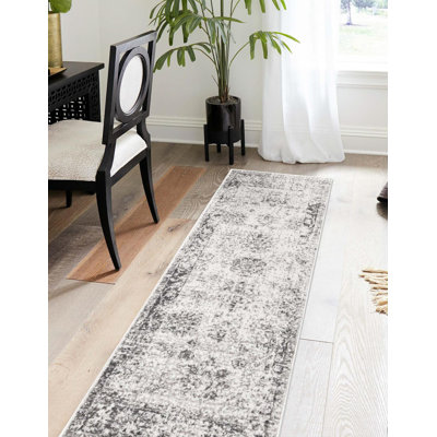 Brandt Floral Area Rug