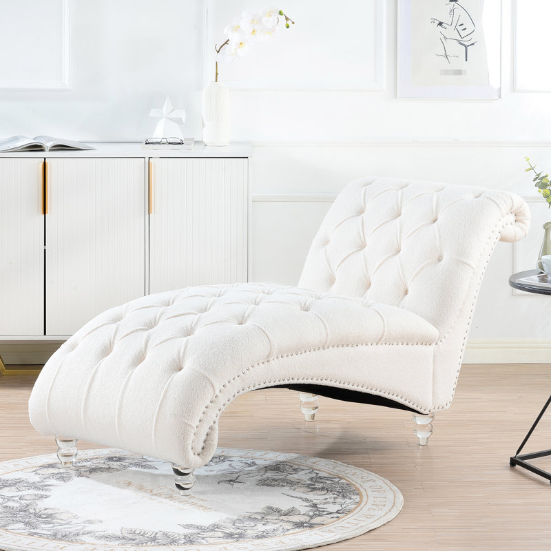 Chaise longue sans accoudoirs avec une grande assise stable, un rembourrage en éponge haute et un rendement de rebond élevé, un savoir-faire emboutissant, des clous à bulles décorées, trois choix de tissus - velours, velours PU, charge