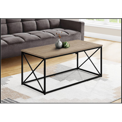 Table basse moderne moderne avec plateau en marbre noir et structure en X robuste pour un décor de salon élégant