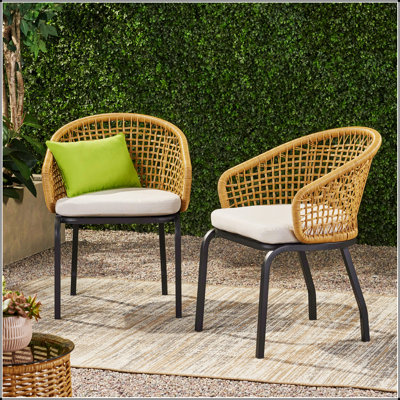 ARIAS CHAIR: Boho Rattan Outdoor Seating With Durable Design And Water-Resistant Cushions For Patio Or Backyard