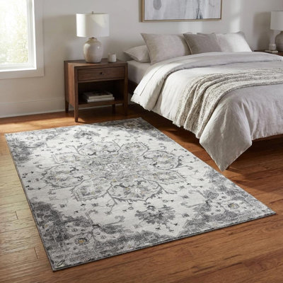 Tapis lavable délavé à médaillon floral ivoire et doré 3 pi x 5 pi avec protection UV